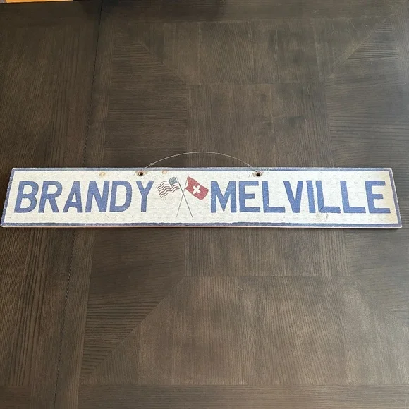 This is an original Brandy Melville sign from Pacsun